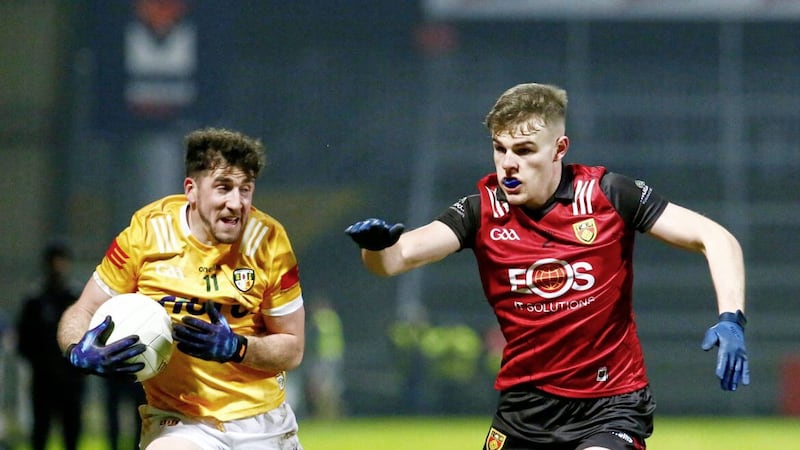 Ryan Magill had a tough battle with Antrim forward Ryan Murray during Saturday night&#39;s National League clash in Newry. Picture by Philip Walsh 