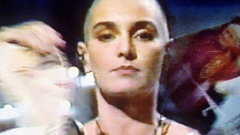 Sinead O'Connor tearing up a picture of Pope John Paul II during a broadcast of US TV show Saturday Night Live.