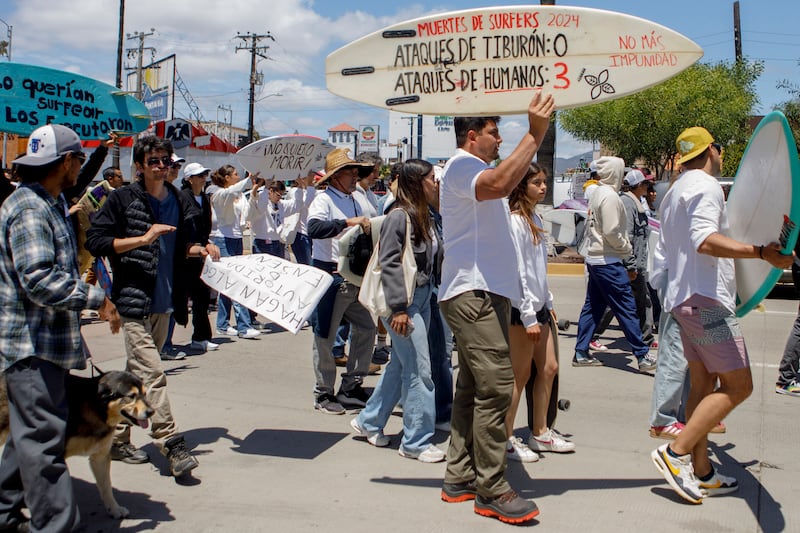 Locals march to protest their disappearance (Karen Castaneda/AP)