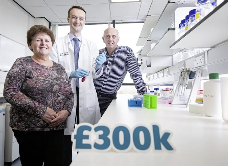 Roisin Foster, chief executive of Cancer Focus NI, launches the new research programme funded by the charity, alongside Dr Richard Turkington and Ivan McMinn 