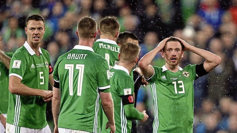 Northern Ireland&#39;s Corry Evans is stunned after the controversal match-winning penalty was awarded against him Picture: PA 