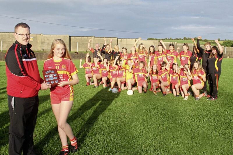 St John&#39;s, Drumnaquoile&rsquo;s big summer of ladies&rsquo; Gaelic continued last week as the U14 girls were crowned league champions. Over 100 supporters packed into the clubroom to see them enjoy their celebrations and, after all the hard work done on the pitch, it was only fitting that Francis Rogan presented the trophy to Shauna Magorrian on the pitch 