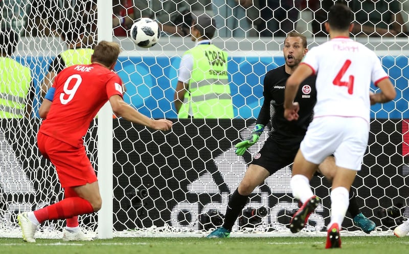 Harry Kane scores against Tunisia