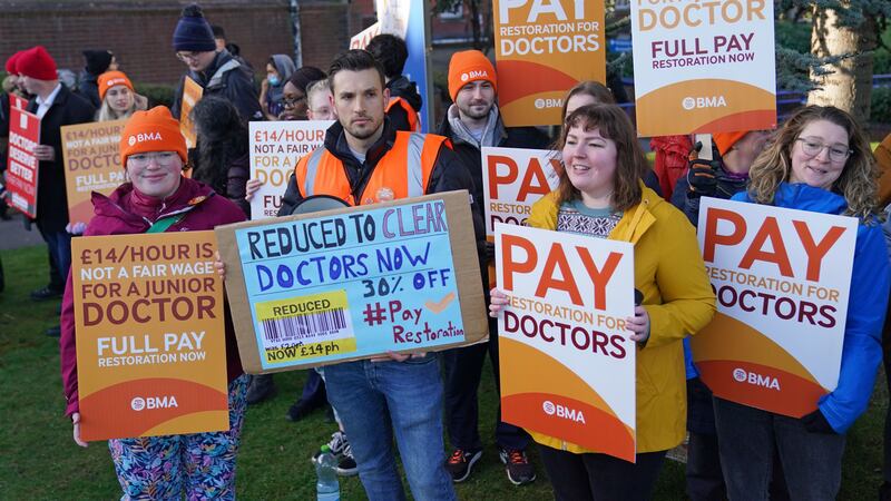 Striking NHS junior doctors on the picket line outside Leicester Royal Infirmary in April (PA)