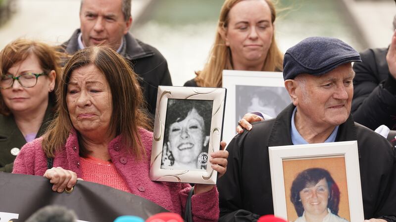 Survivors, family members and supporters in the Garden of Remembrance in Dublin after the Stardust fire inquest verdict was returned