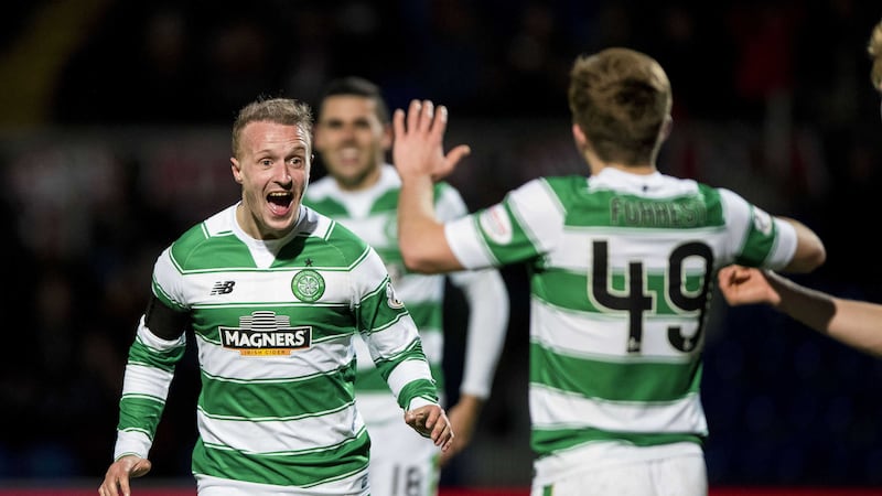 Celtic's Leigh Griffiths celebrates scoring his side's third goal of the game against Ross County in Dingwall on Sunday<br />Picture: PA&nbsp;
