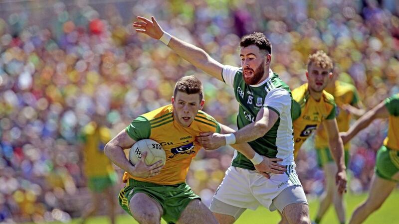 Donegal&#39;s Eoghan Ban Gallagher comes under pressure from Fermanagh&#39;s Seamus Quigley during the Ulster SFC final at Clones on Sunday June 24 2018. Picture by Seamus Loughran. 