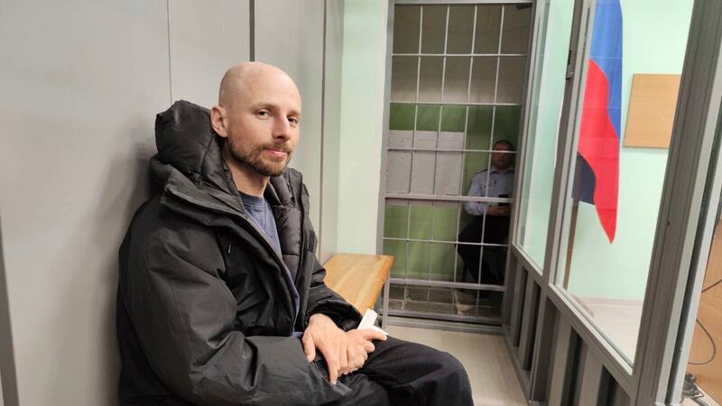 Russian journalist Sergey Karelin appears in court in the Murmansk region of Russia after his arrest on ‘extremism’ charges, which he denied (AP Photo)