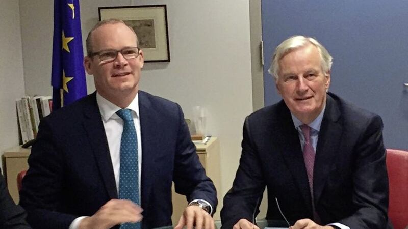 Simon Coveney with Michel Barnier in Brussels yesterday 