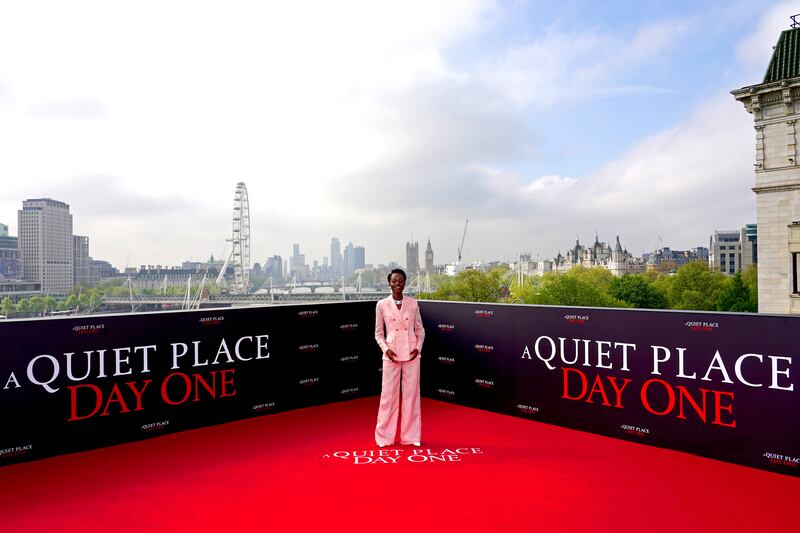 Lupita Nyong’o wore a baby pink suit