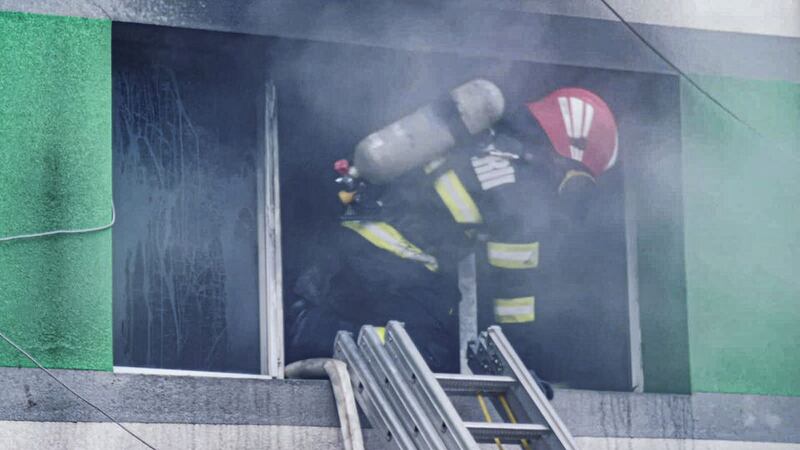 A firefighter works to put out a blaze at the COVID-19 ICU section of the Hospital for Infectious Diseases in the Black Sea port of Constanta, Romania, Friday, October 1, 2021 (Romanian Emergency Situations Inspectorate, IGSU via AP)&nbsp;