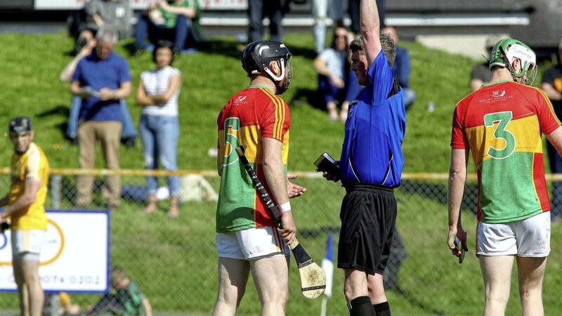 Carlow&#39;s Richard Coady received a red card for striking Antrim&#39;s Neil McManus but he merits more than the minimum two-match ban. Pic Seamus Loughran 