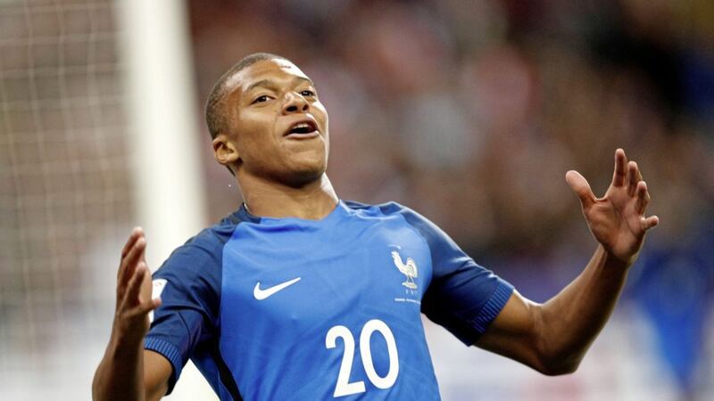 France&#39;s Kylian Mbappe celebrates scoring France&#39;s fourth goal during the 4-0 win over Holland at the Stade de France 