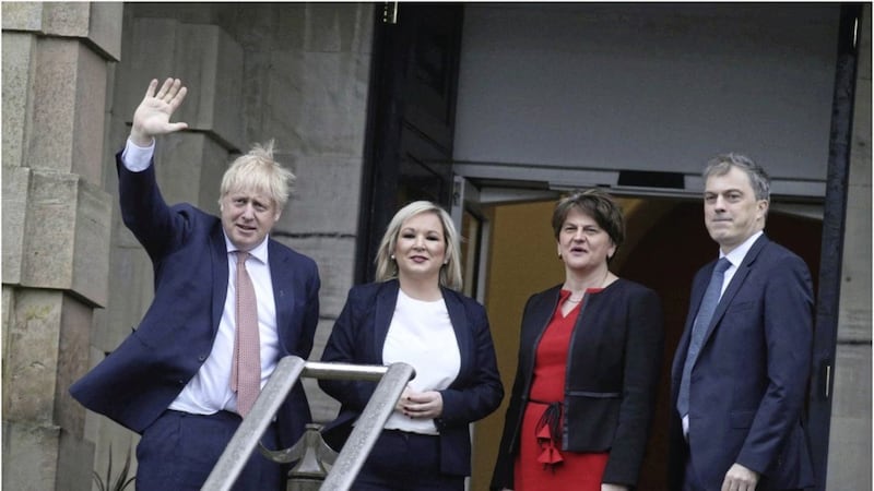 Boris Johnson is greeted by the first and deputy first ministers Arlene Foster and Michelle O&#39;Neill and secretary of state Julian Smith Picture by Hugh Russell. 