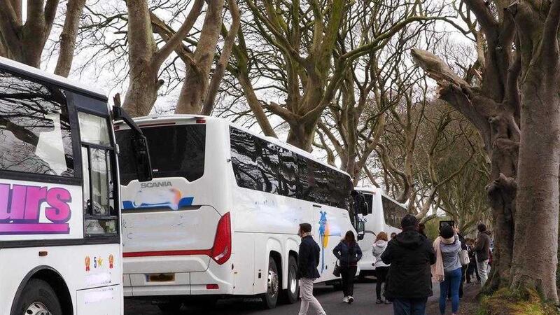 Vehicles including tourist buses flock to the Dark Hedges. Picture by Bob McCallion 