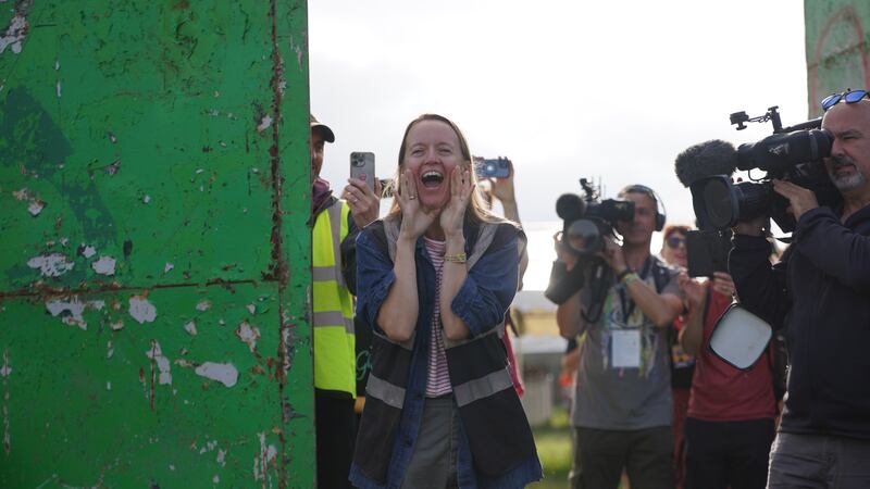 Emily Eavis opens the gates on the first day of the Glastonbury Festival 2023 (Yui Mok/PA)