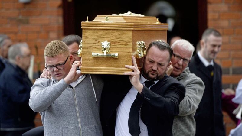The coffin of Colin McGarry is carried from Sacred Heart Church on the Oldpark Road, Belfast. Picture Mark Marlow 