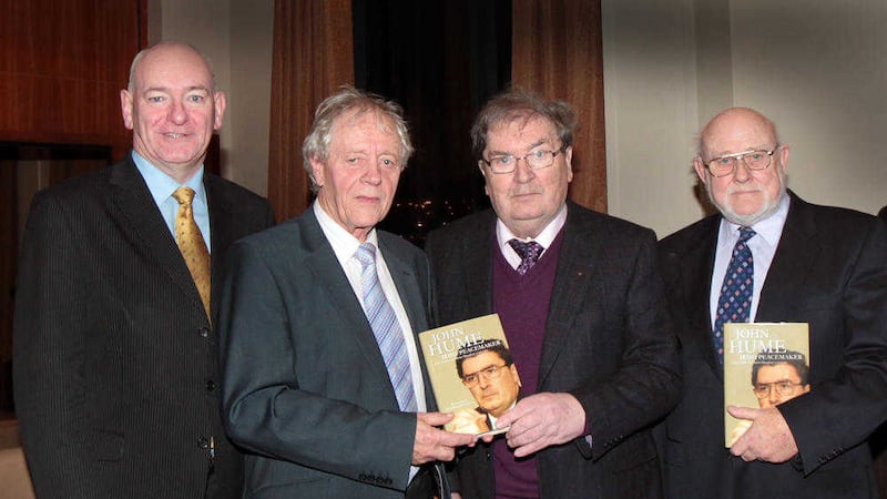 John Hume at the launch of a new book dedicated to his work, at the City Hotel in Derry. Pictured with authors Sean Farren and Denis Haughey with Mark Durkan MP. Picture by Margaret McLaughlin. 