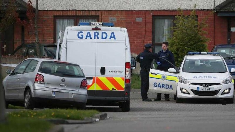 Gardai at the scene in Kilcronin Close, west Dublin, where a man 37-year-old Tom Farnan was shot dead on Monday night 