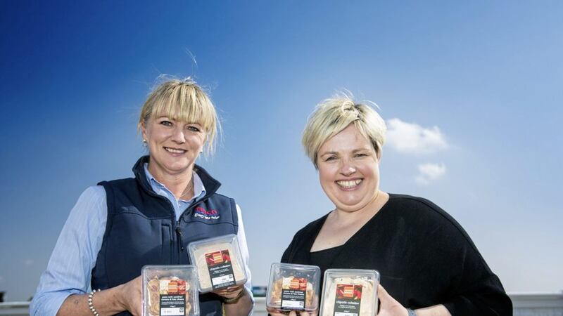 Caoimhe Mannion (left), marketing manager at Tesco Northern Ireland, with Dawn Cann, marketing manager of Country Kitchen 