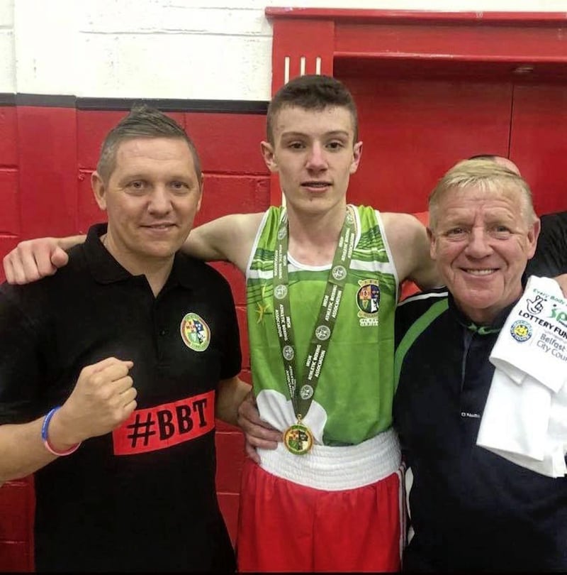 Jon McConnell with Liam Cunningham (left) and Holy Trinity coach Michael Hawkins 