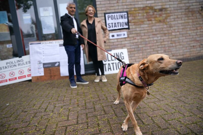 Sadiq Khan with his wife Saadiya Khan and dog Luna visited a polling station in south London