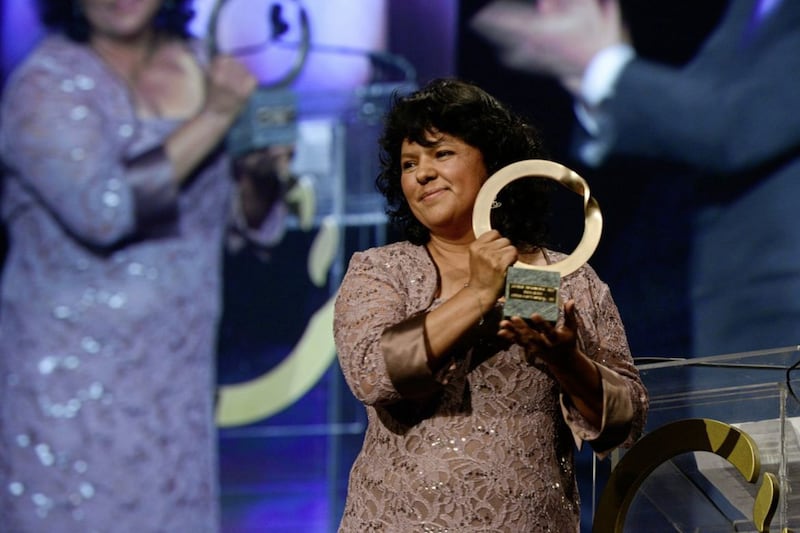 Berta C&aacute;ceres receiving the Goldman Environmental Prize in 2015, a year before she was shot dead in her bedroom. Picture by Steve Fisch Photography 