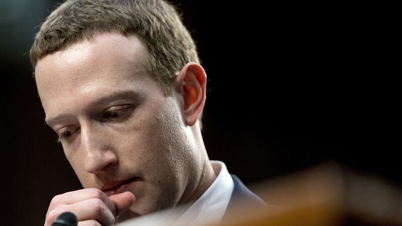 The Facebook founder has been answering questions on his second day of grilling by politicians in Washington.
