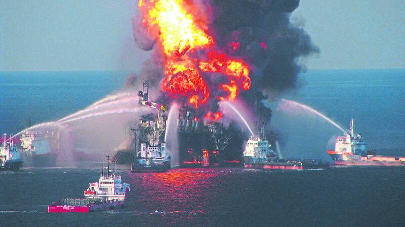 Response crews battle the blow out of British oil company BP&#39;s offshore oil rig Deepwater Horizon in 2010 