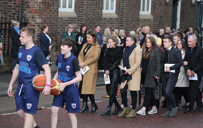 Noah Donohoe&rsquo;s family had encouraged people to gather outside his school, St Malachy&rsquo;s, as the cort&eacute;ge would stop there following Requiem Mass. Picture by Niall Carson, PA<br />&nbsp;