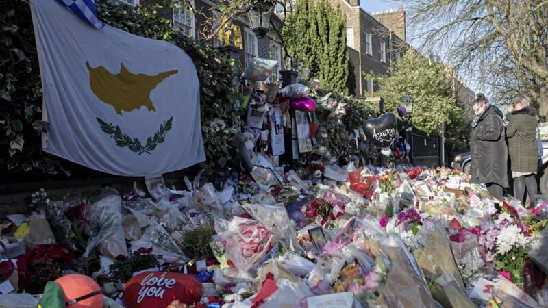 Flowers outside the home of George Michael in Highgate, north London, on Monday. Picture by Stefan Rousseau, Press Association