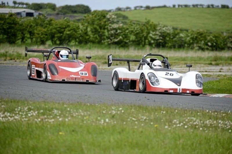 Jim Larkham (20) watching his mirrors for Steven Larkham&#39;s attack (93) in the Roadsports race. Picture by Jimmy Graham 