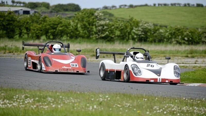 Jim Larkham (20) watching his mirrors for Steven Larkham&#39;s attack (93) in the Roadsports race. Picture by Jimmy Graham 