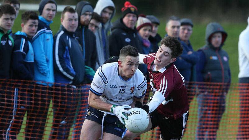 UUJ's Evan Regan gets away from St Mary's Patrick McAleer during Wednesday's game <br />Picture by Hugh Russell