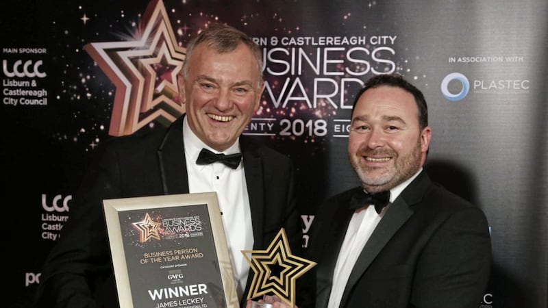 Winner of the Business Person of the Year accolade at the LCCC Awards is James Leckey, seen receiving his award from Stephen Houston, director of category sponsor GMcG Chartered Accountants. Photo: Darren Kidd/PressEye 