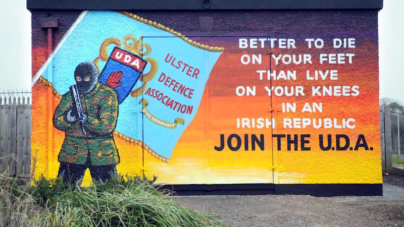 There were been calls for police to investigate the appearance of a new paramilitary mural that has appeared in the Glenfield estate in Carrickfergus, Co Antrim in February 2015