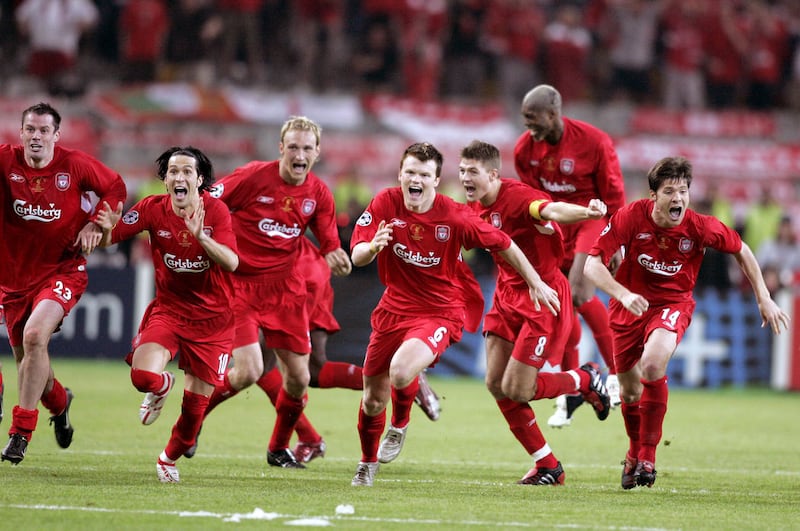 Liverpool players run to goalkeeper Jerzy Dudek to celebrate after AC Milan's Andriy Shevchenko misses his penalty in the Champions League final on Wednesday May 25 2005. Picture by Phil Noble/PA Wire.&nbsp;