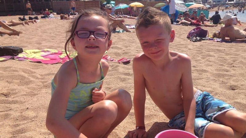 Olivia and Freddie Foley on the beach at Saint Raphael 