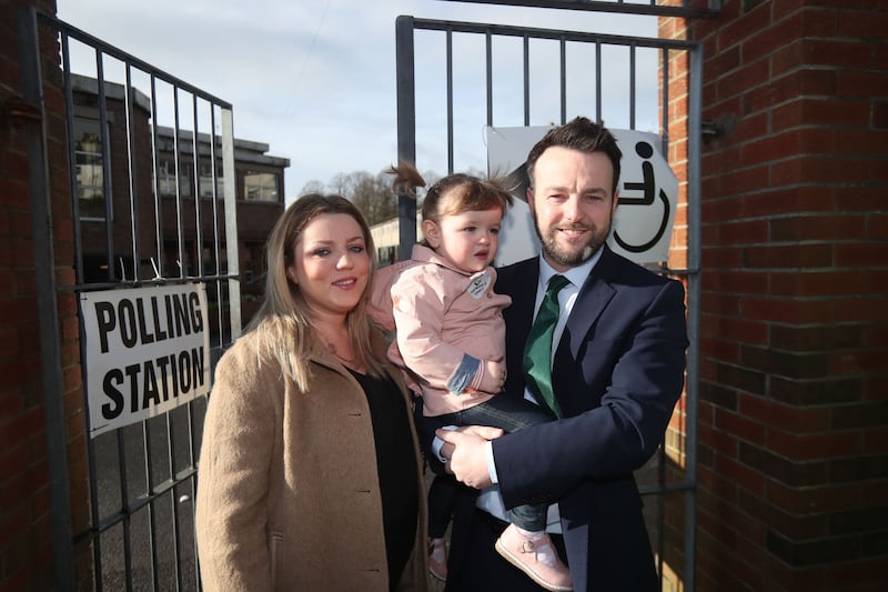 SDLP leader Colum Eastwood with wife Rachael and daughter Rosa arriving at Model Primary School in Derry to cast their votes in the Northern Ireland Assembly elections. Niall Carson/PA Wire&nbsp;