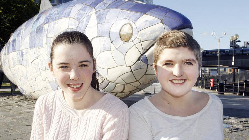 Aine Wills, who will sail on one of the tall ships to visit Belfast next month, with her sister Caoimhe to whom she donated her bone marrow. Picture by Aidan O&rsquo;Reilly