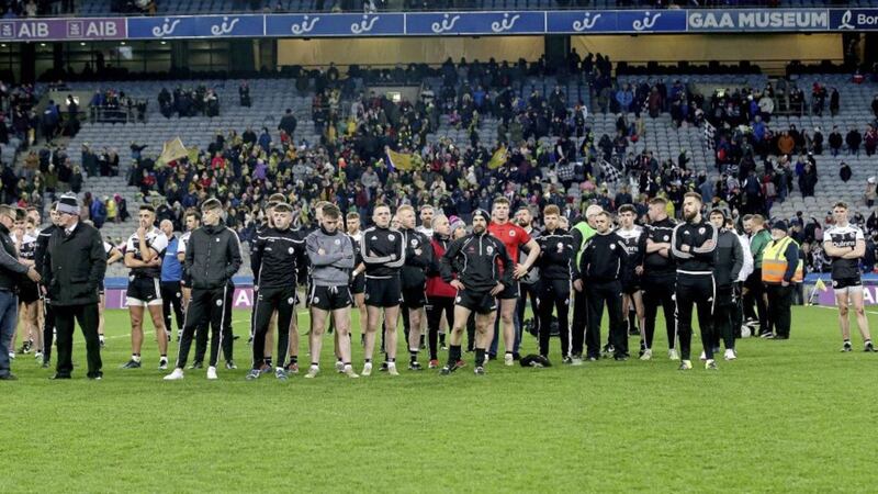 The dejected Kilcoo players after yesterday&#39;s All-Ireland Club final defeat to Corofin. Picture by Seamus Loughran 