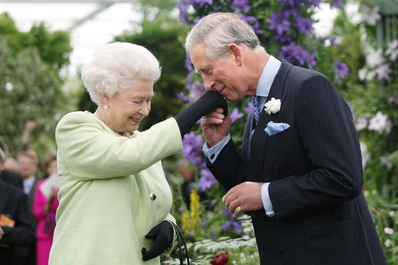 The late Queen presenting her son the then-Prince of Wales with the Royal Horticultural Society’s most prestigious award, the Victoria Medal of Honour at Chelsea in 2008