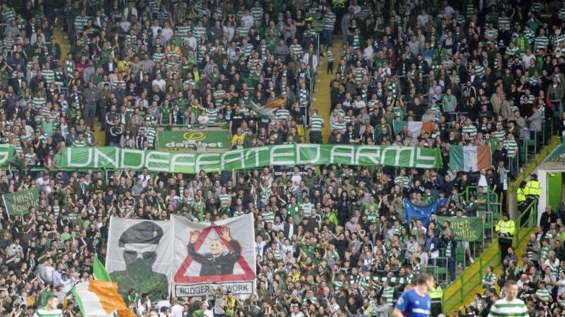 Fans display banners at Celtic Park on Wednesday, prompting a fresh investigation by UEFA. Jeff Holmes/PA Wire. 