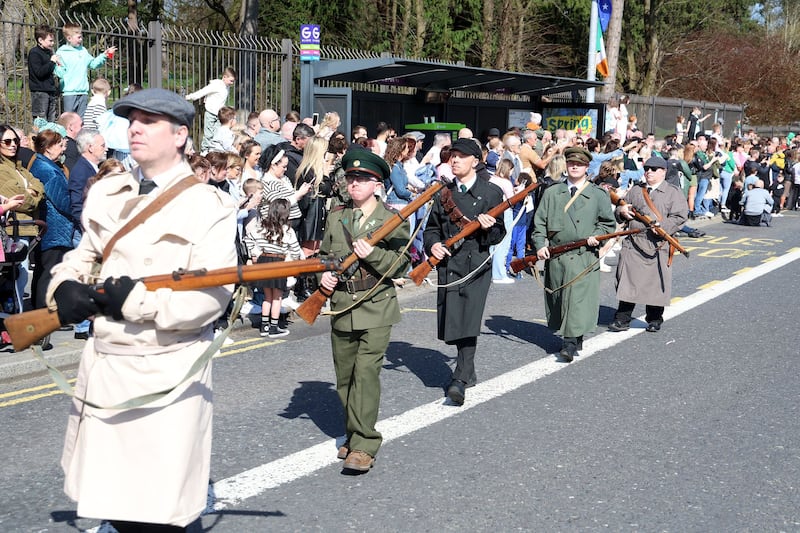 Participants in costume with replica weapons taking part in Sunday's west Belfast parade to commemorate the 108th anniversary of the Easter Rising. PICTURE: MAL MCCANN