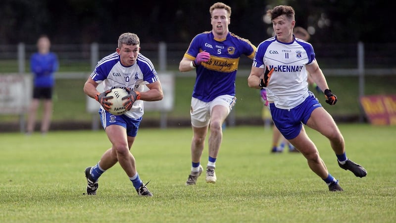 Maghery&#39;s David Lavery tangles with Armagh Harps&#39; Ryan McShane and Joe McElroy. Picture Seamus Loughran. 