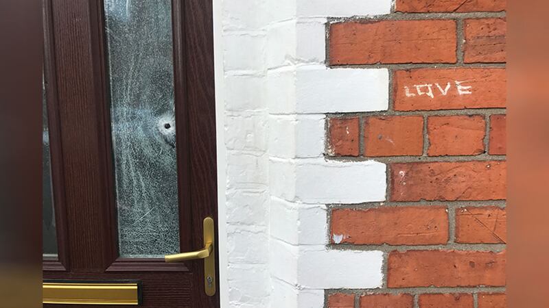 &nbsp;A bullet passed through the glass in the front door. Picture by Mal McCann
