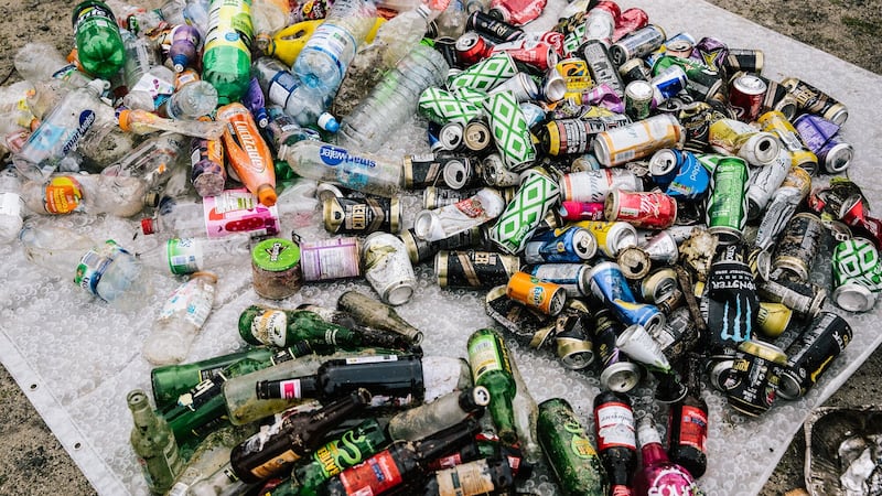 Large numbers of bottles and cans were found on a beach during a year-long collection (Ian Lean/PA)