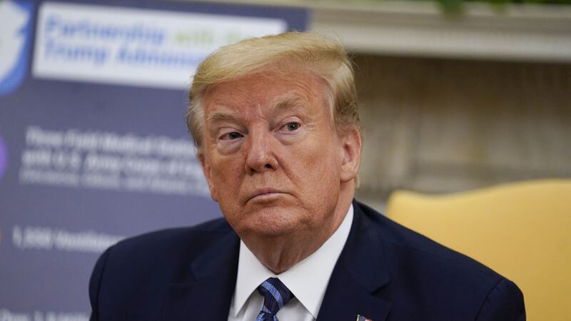President Donald Trump pictured in the Oval Office of the White House during a meeting about the coronavirus response. Photo by AP/Evan Vucci, Thursday, April 30, 2020&nbsp;
