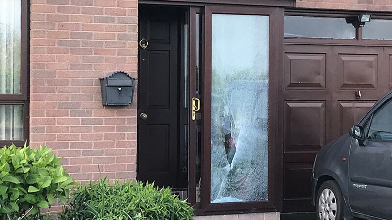 Damage can be seen at the front of the house in Lurgan following the attack that left occupants &quot;badly shaken&quot;. Picture by Mal McCann&nbsp;