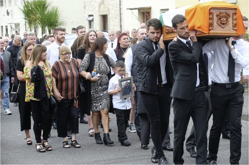 The funeral of Seamus Conlon on the way to Corpus Christi Church in Wsy Belfast Piture by Hugh Russell. 